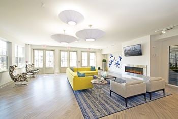 Breathtaking multi-story clubhouse with glass interior overlooking other floors